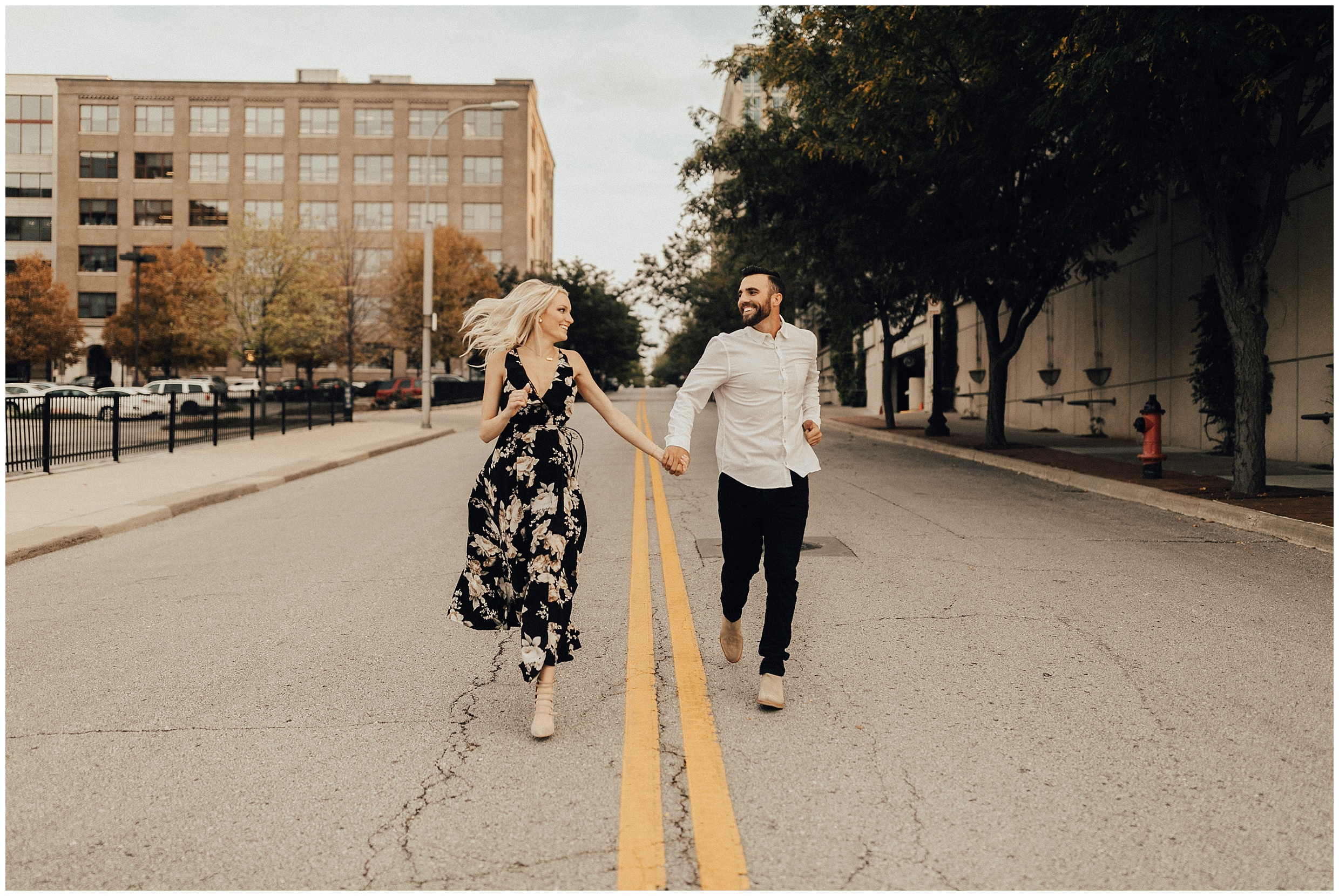 Engagement photos, what to wear for engagement session, save the date, couples posing, engagement photo ideas, Kansas City engagement photos, Kansas city engagement photographer, downtown Kansas City engagement photos, river market engagement photos, downtown Kansas City engagement session, river market engagement session